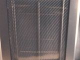 a black and silver microwave sitting on a wooden table