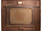 a picture of a wooden frame with a picture hanging on it