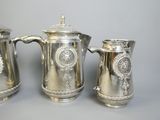 three pieces of silverware sitting next to each other on a table