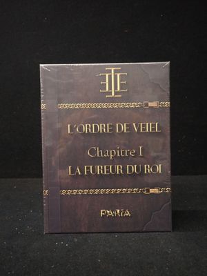 un livre posé sur une table noire