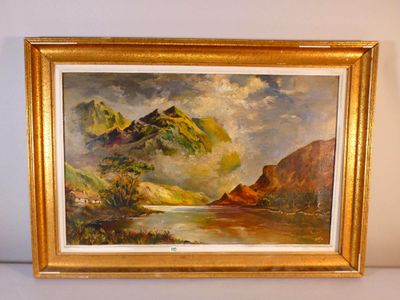 a picture of a painting of mountains in a gold frame
