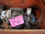 a pile of junk in a dumpster with a price tag on it