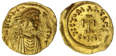 une pièce d'or portant l'image d'un homme