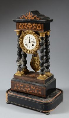 a clock that is sitting on top of a table