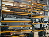a room with a lot of shelves and a lot of boxes