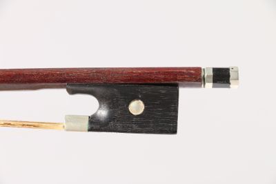 the bow is made of wood and has a metal tip