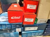 several boxes are stacked on top of each other in a room