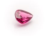 a pink tourmaline gems on a white background