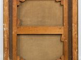 an old wooden frame with a brown canvas on the bottom