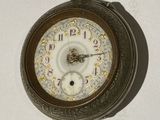 a clock that is hanging on the wall in the room