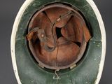 a baseball helmet that has a baseball inside of it