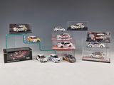 a lot of different model cars on display in a case