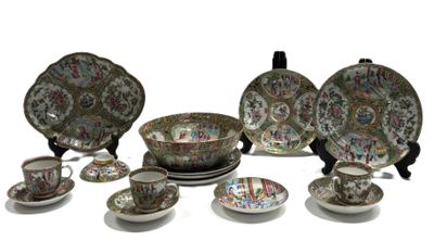 many different types of dishes and cups on the table