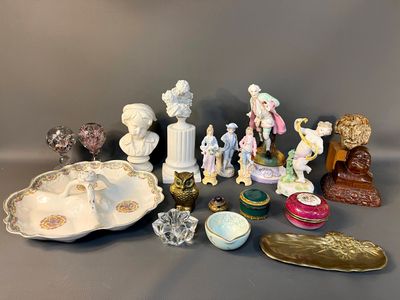 a lot of figurines that are sitting on a table