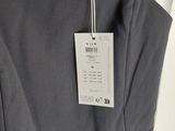 a close up of a dress with a tag on it