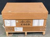 a cardboard box that is sitting on top of a pallet