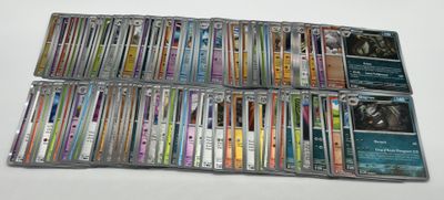 a lot of cassettes that are sitting on a table