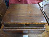 a wooden box that is sitting on a table