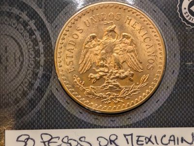 a gold coin with a picture of a woman on it