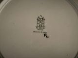 a close up of a plate with a castle on it