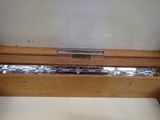 a close up of a wooden box with a train on it