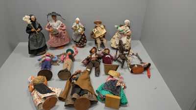 a lot of figurines that are sitting on a table