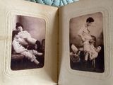 two old photos of a woman and a baby in a book