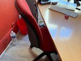 a desk with a computer and a monitor on it