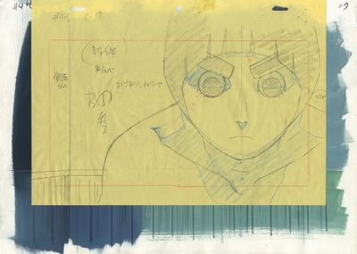 un morceau de papier jaune sur lequel est dessiné le visage d'un homme
