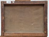 an old wooden easel with a canvas on top of it