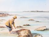 a painting of a man standing on a rock by the water