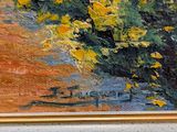 a painting of yellow flowers in a vase on the wall