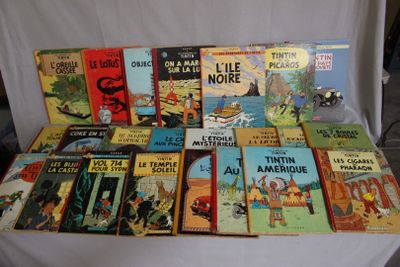 a lot of books that are on a table