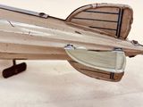 a toy airplane that is sitting on a table