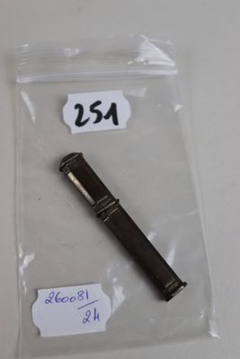 a pen in a bag with a price tag on it