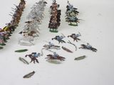 a lot of figurines that are sitting on a table