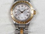 an image of a woman ' s wrist watch with roman numerals on it