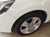 a white car that is parked in a garage