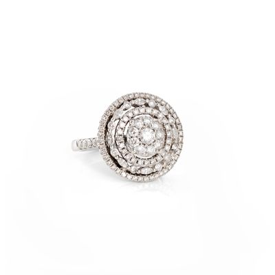 a close up of a diamond ring on a white background