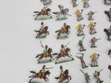 a lot of figurines that are on the table