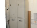 two lockers in the corner of a room that is being remodeled