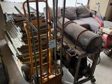 a cart with a bunch of items on it in a room