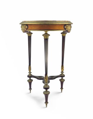 a small table with a marble top and two legs