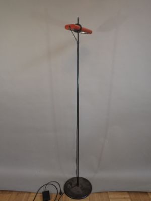 an image of a lamp that is on a wooden floor