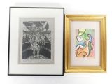 two framed pictures of a woman and a dragon on a white wall