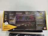 a box that has a keyboard in it on a table