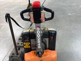 an image of a concrete floor polisher in a warehouse