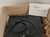 a box with a laptop in it and a sign on it