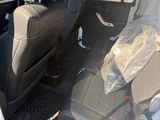 a car that has a bag in the back of it
