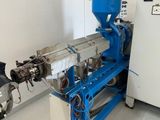 a machine that is sitting in a room next to a wall